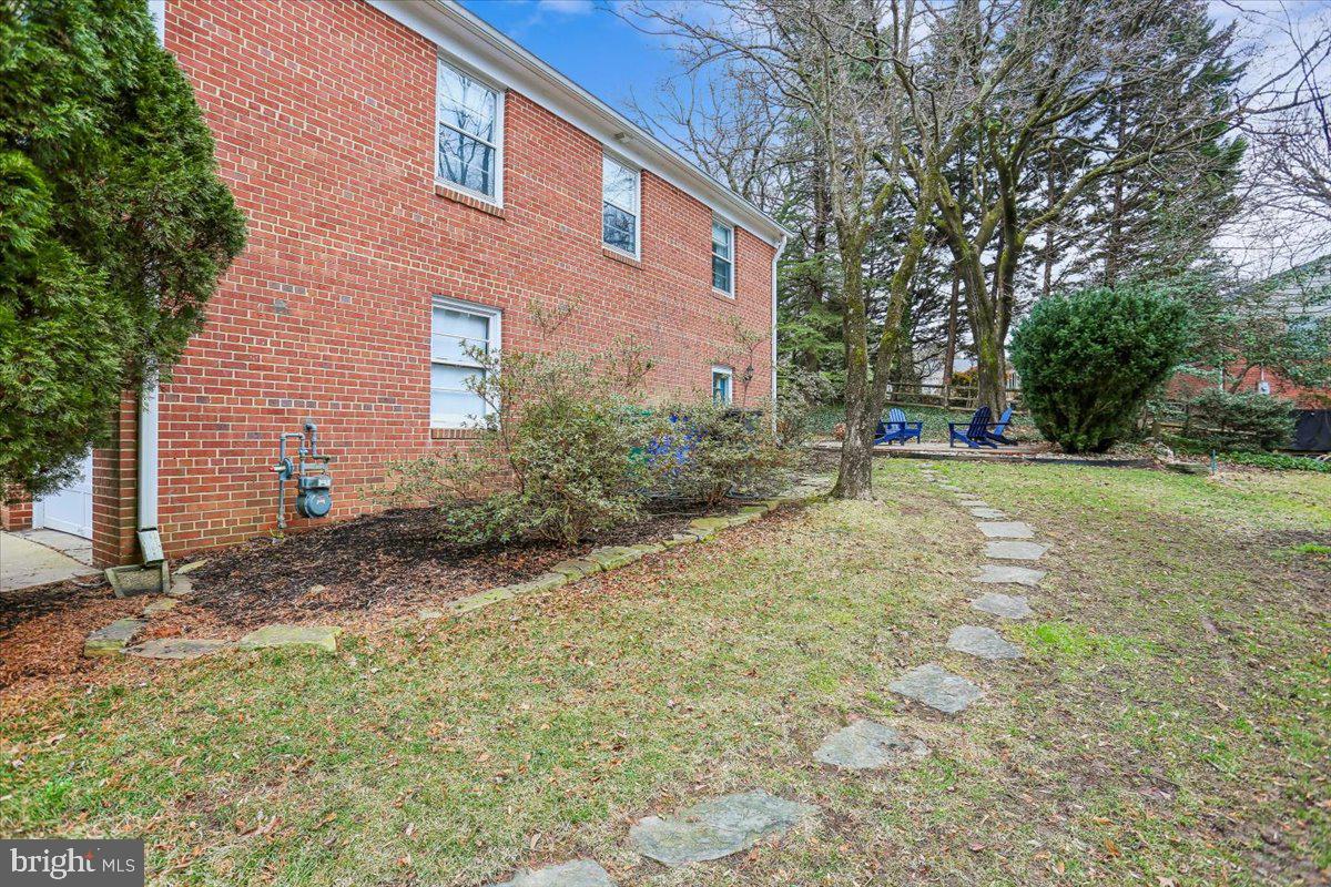 3612 Littledale Road Kensington, MD 20895 - Photo 73 of 79 a view of a backyard with a garden and entertaining space