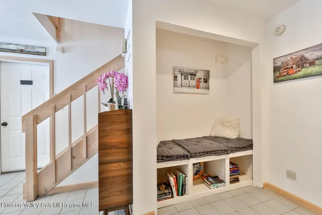 a spacious bathroom with sinks mirror and a bathtub