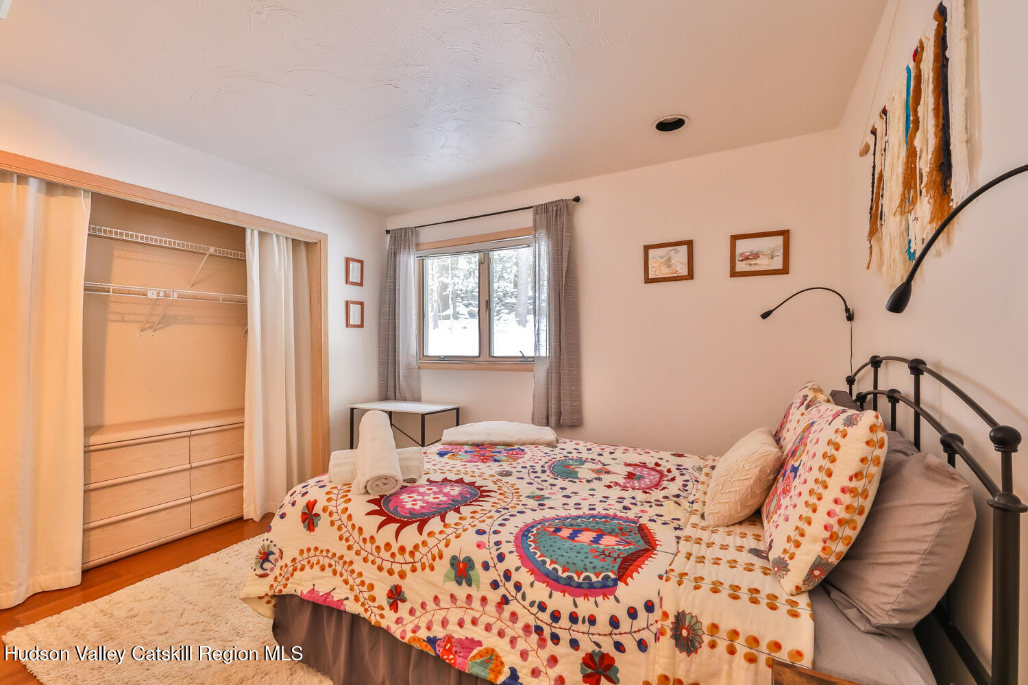 31 Koonan Road Windham, NY 12496 - Photo 15 of 48 a bedroom with a bed and a window