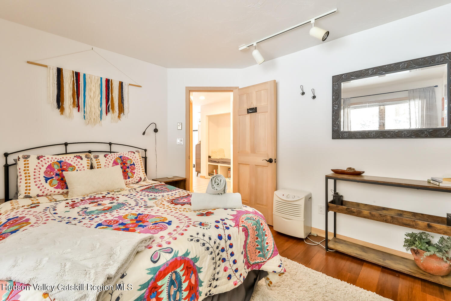 31 Koonan Road Windham, NY 12496 - Photo 16 of 48 a bedroom with a bed and a window