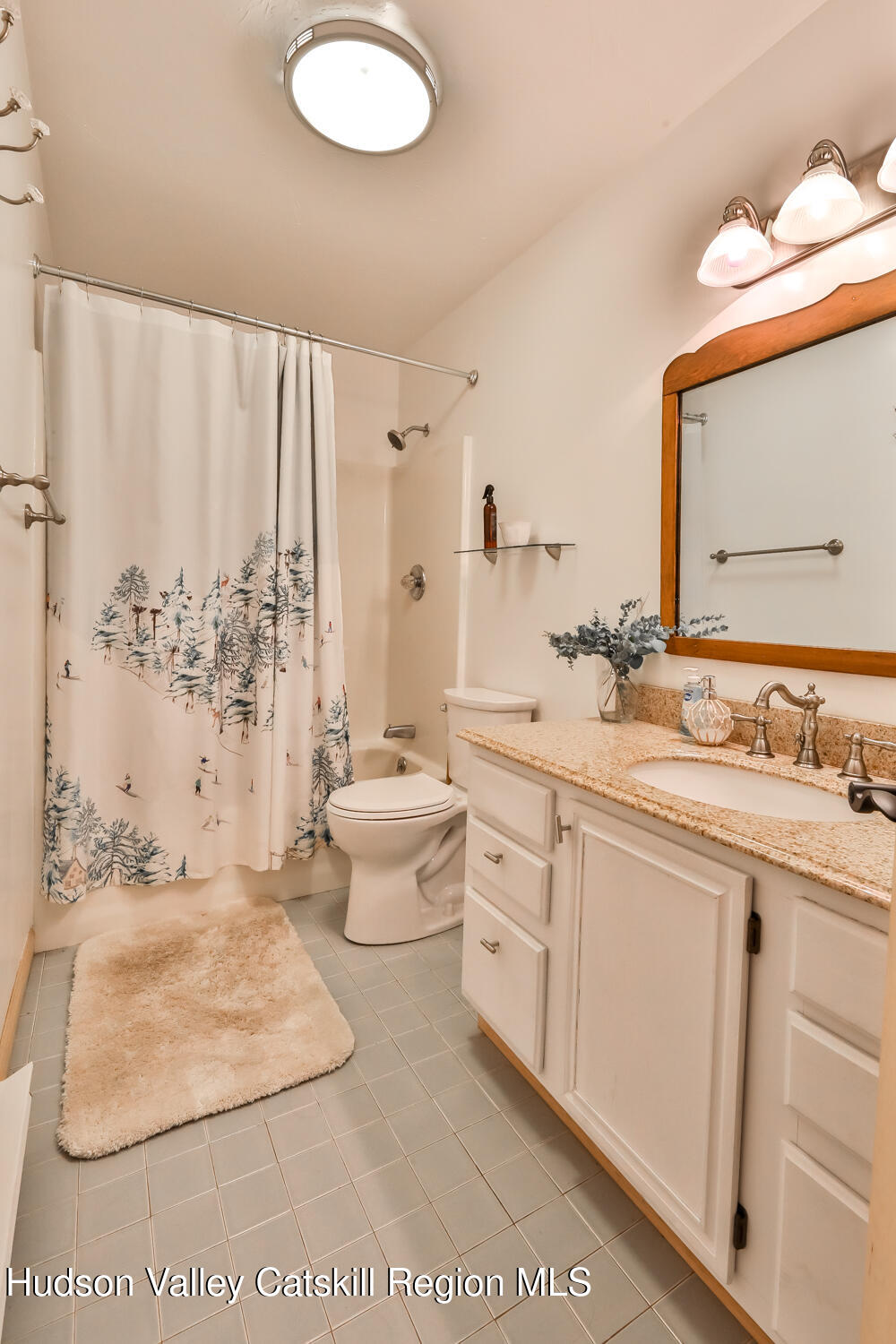 31 Koonan Road Windham, NY 12496 - Photo 20 of 48 a spacious bathroom with sinks mirror and a bathtub