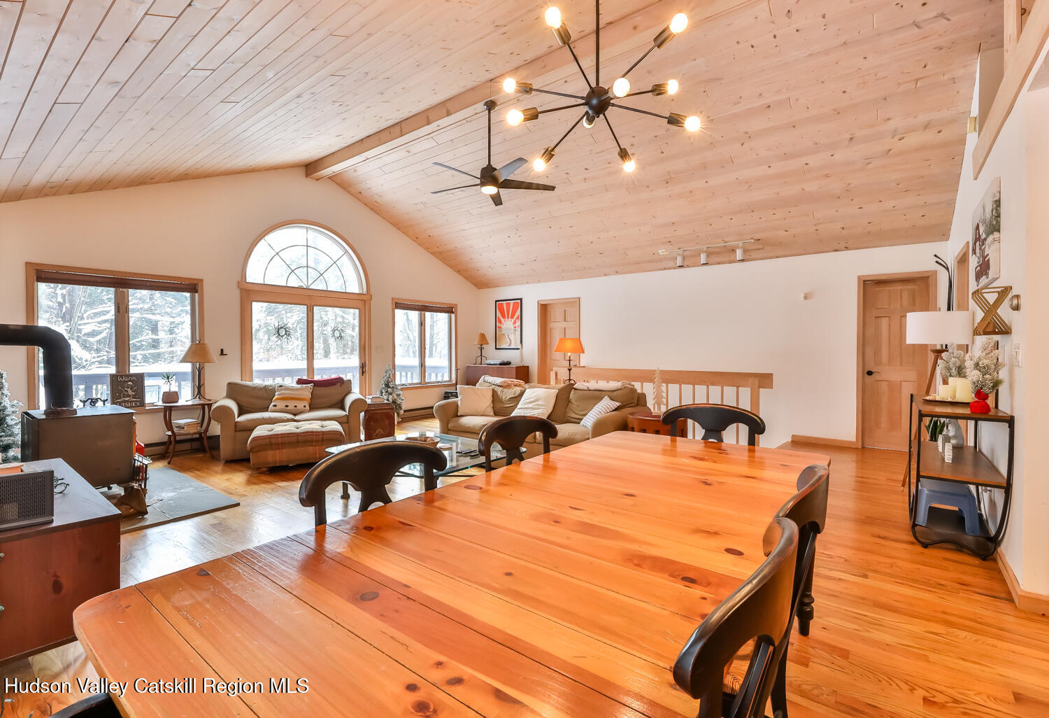 31 Koonan Road Windham, NY 12496 - Photo 27 of 48 a living room with lots of furniture and a large window