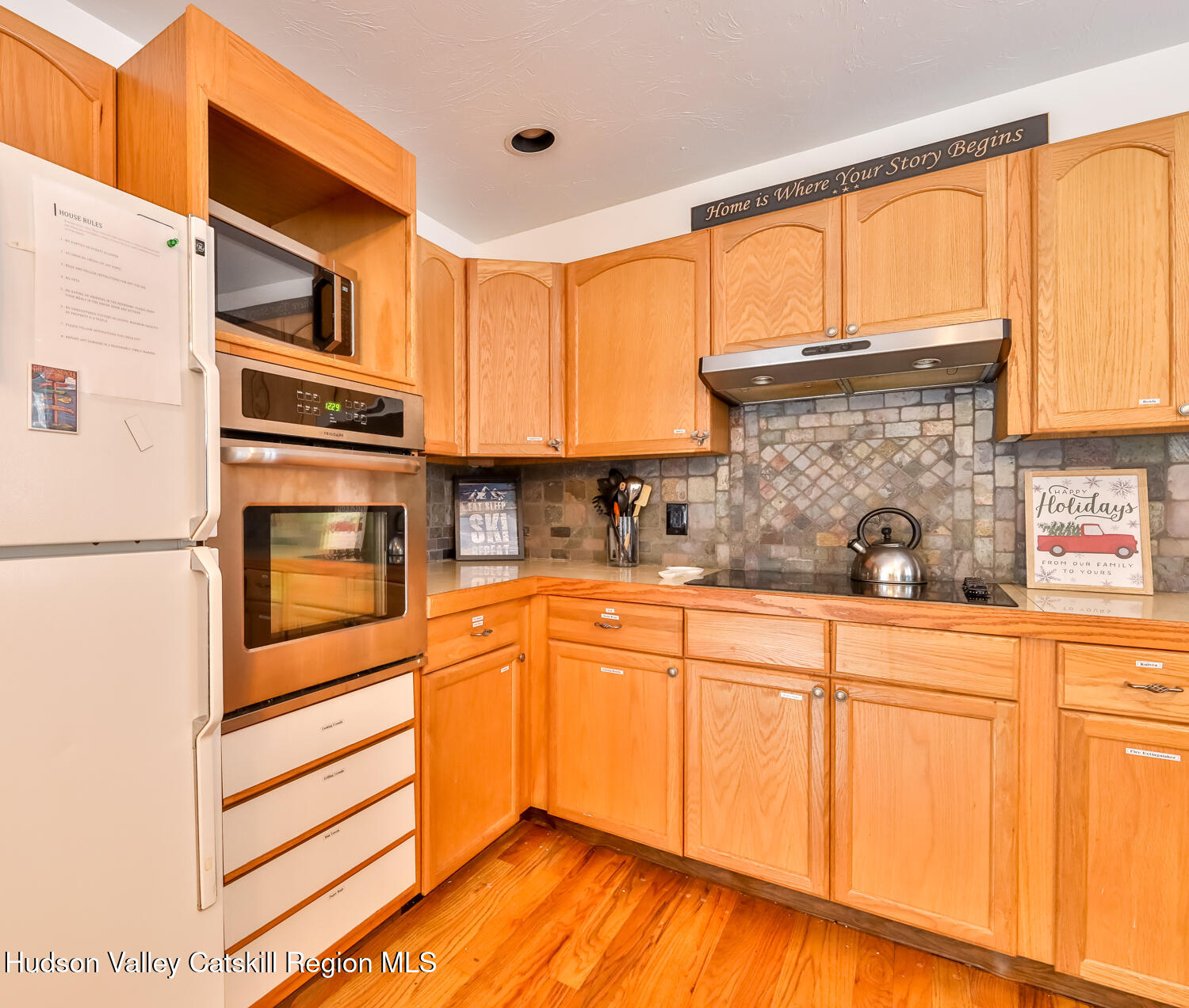 31 Koonan Road Windham, NY 12496 - Photo 36 of 48 a kitchen with granite countertop stainless steel appliances and cabinets