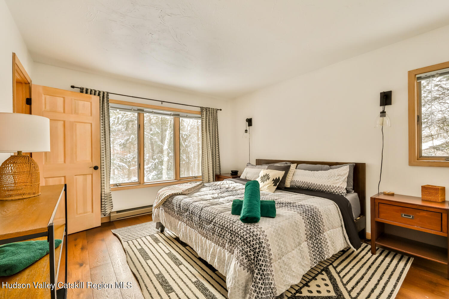 31 Koonan Road Windham, NY 12496 - Photo 37 of 48 a bedroom with a bed and wooden floor