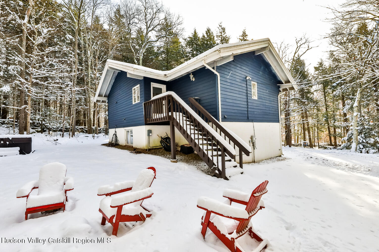 31 Koonan Road Windham, NY 12496 - Photo 47 of 48 a backyard of a house with table and chairs