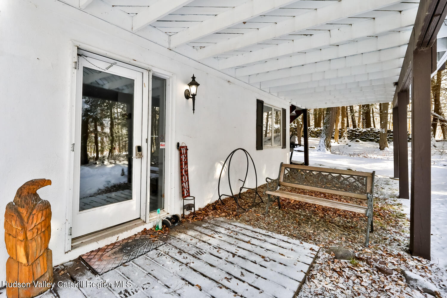 31 Koonan Road Windham, NY 12496 - Photo 9 of 48 a bedroom with a bed and glass door