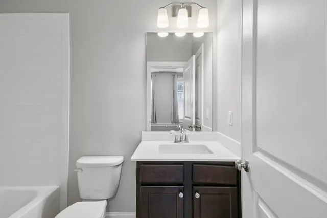 a bathroom with a sink and a toilet