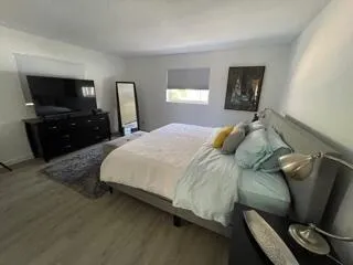 a bathroom with a shower curtain