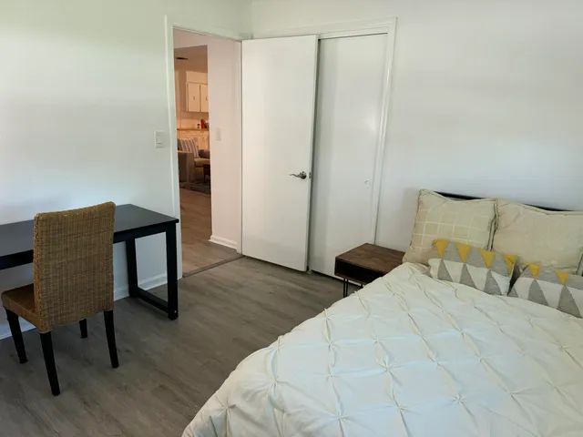 a kitchen with stainless steel appliances and cabinets