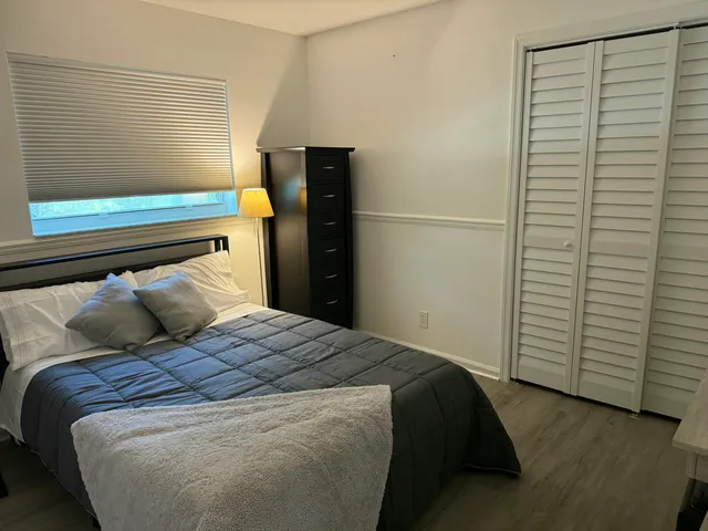 a backyard of a house with seating space