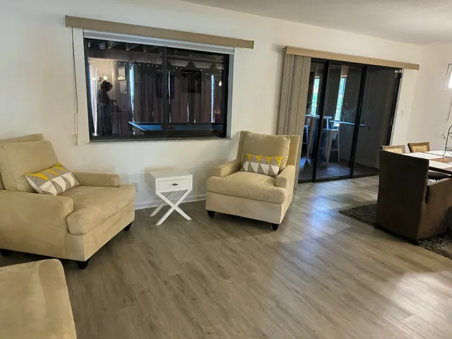 a bedroom with a bed and a television in it