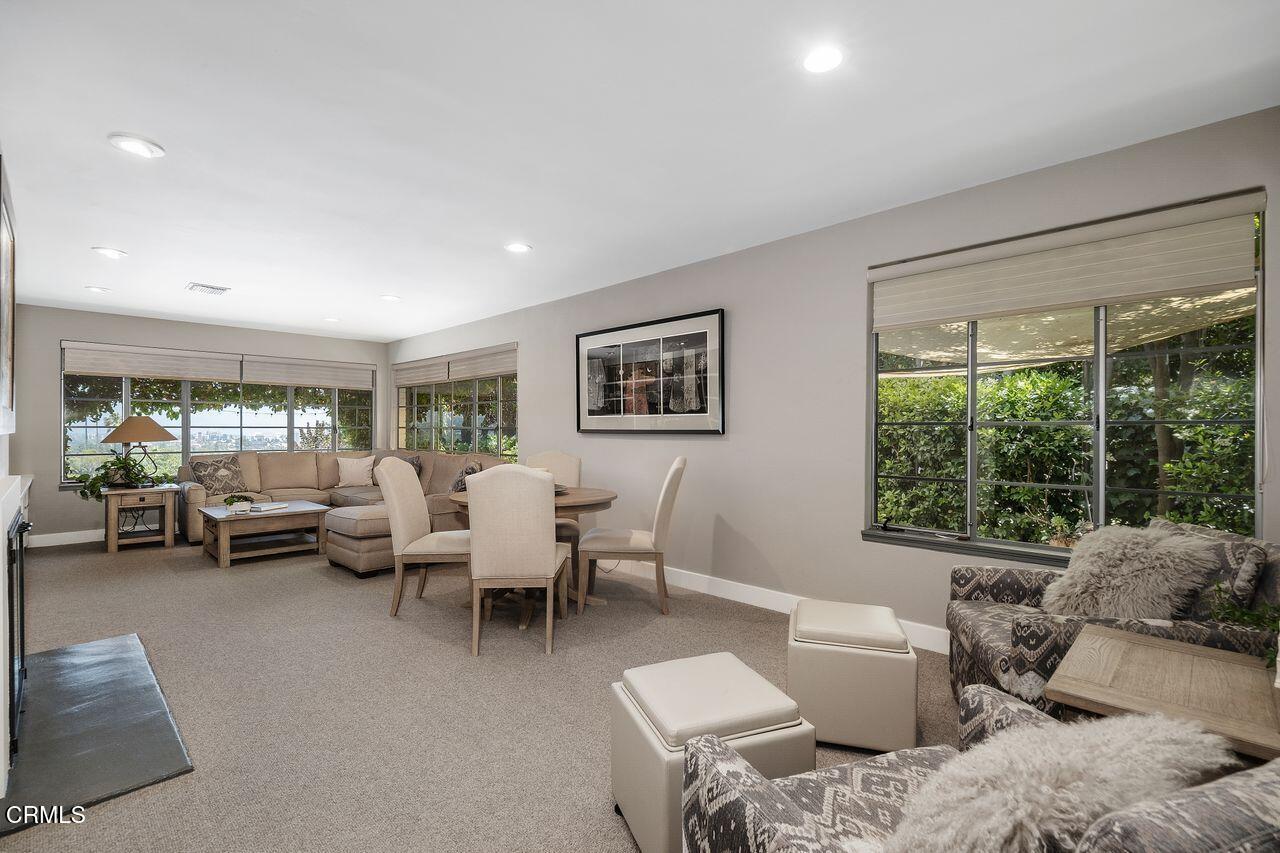 320 North San Rafael Avenue Pasadena, CA 91105 - Photo 11 of 58 a living room with furniture and a large window