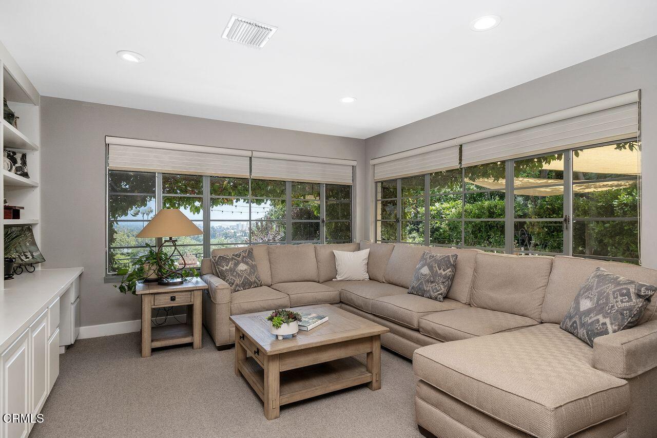 320 North San Rafael Avenue Pasadena, CA 91105 - Photo 12 of 58 a living room with furniture and a large window
