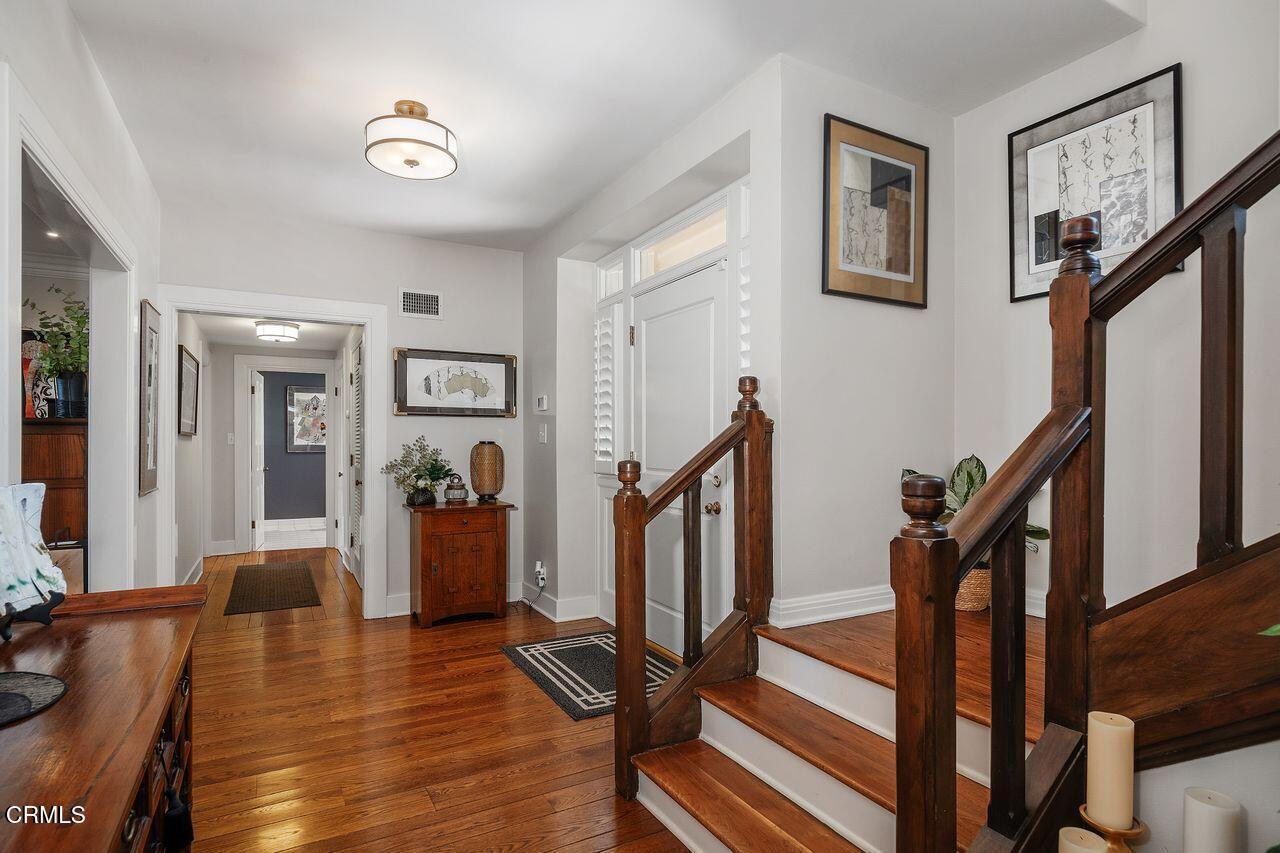 320 North San Rafael Avenue Pasadena, CA 91105 - Photo 21 of 58 a view of a livingroom with furniture and hardwood floor