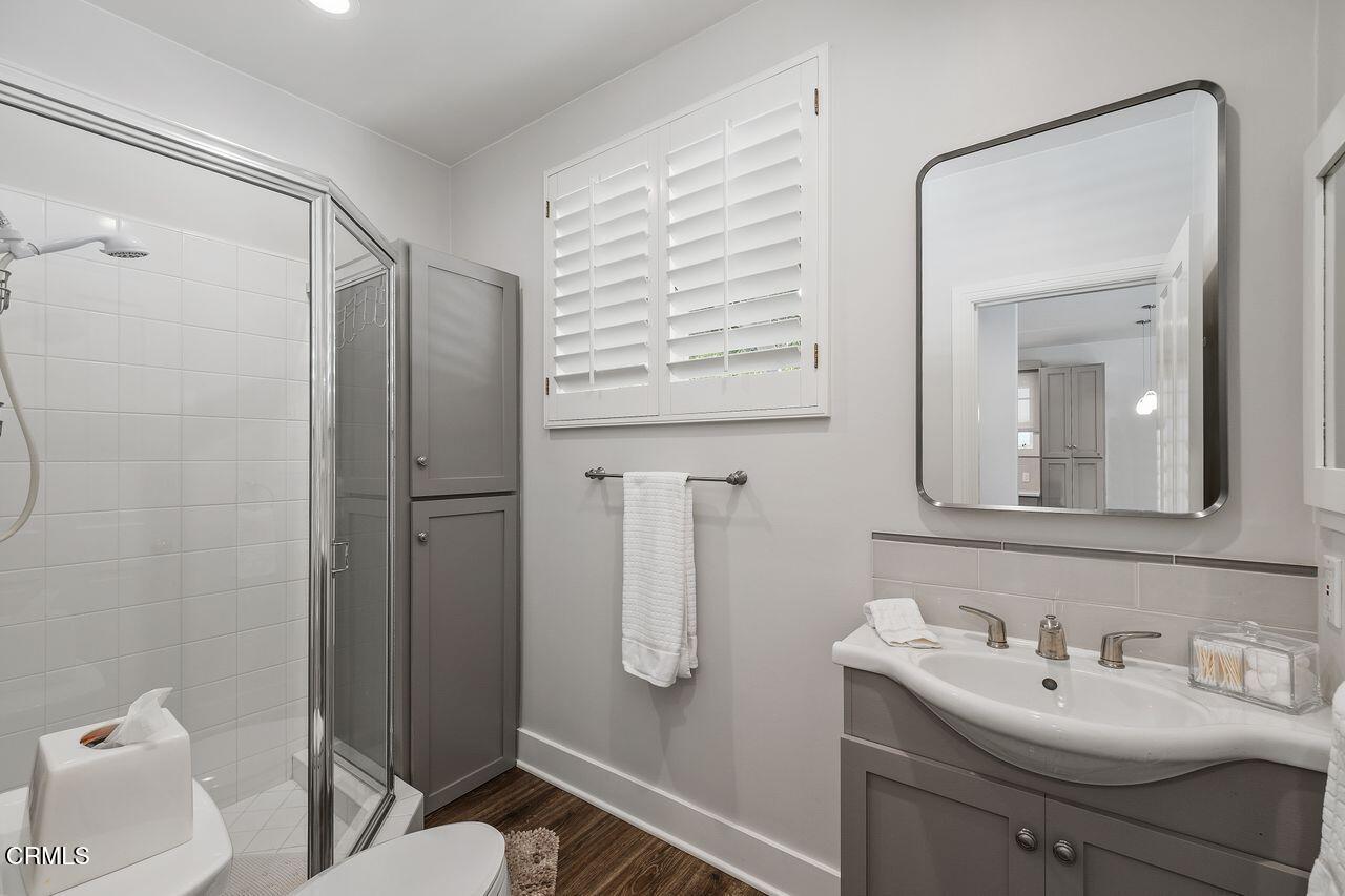 320 North San Rafael Avenue Pasadena, CA 91105 - Photo 25 of 58 a bathroom with a sink a toilet and shower