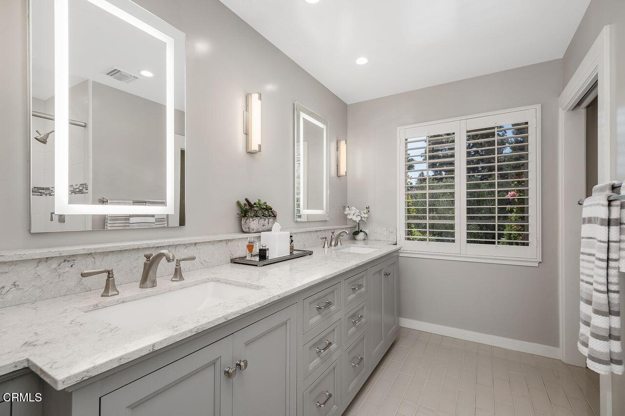 320 North San Rafael Avenue Pasadena, CA 91105 - Photo 29 of 58 a bathroom with double sink and a window