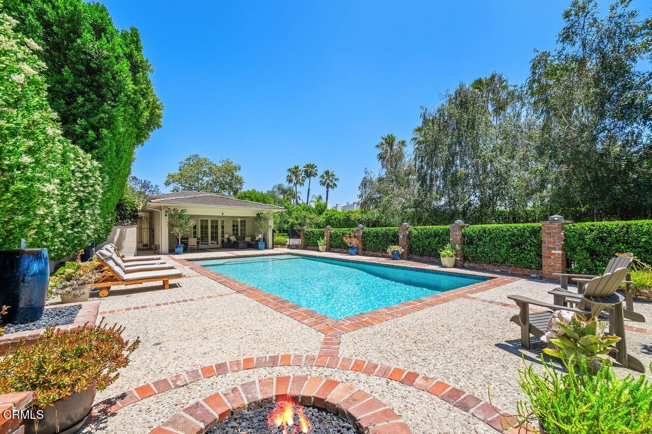 320 North San Rafael Avenue Pasadena, CA 91105 - Photo 35 of 58 a view of a swimming pool with a patio