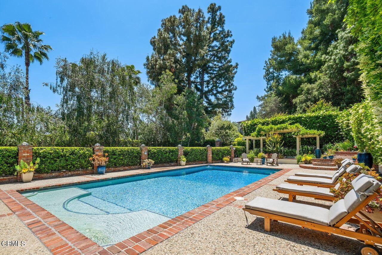 320 North San Rafael Avenue Pasadena, CA 91105 - Photo 36 of 58 swimming pool view with a couple of trees