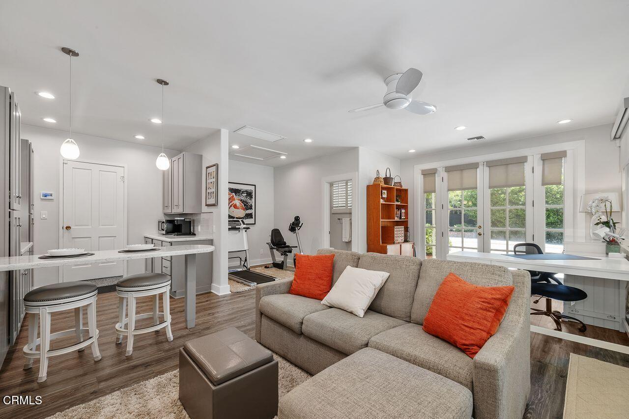 320 North San Rafael Avenue Pasadena, CA 91105 - Photo 38 of 58 a living room with stainless steel appliances furniture and a large window