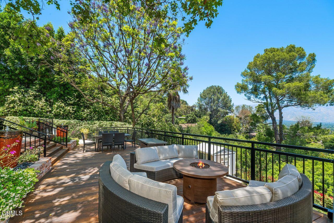 320 North San Rafael Avenue Pasadena, CA 91105 - Photo 39 of 58 a balcony with wooden floor and outdoor seating