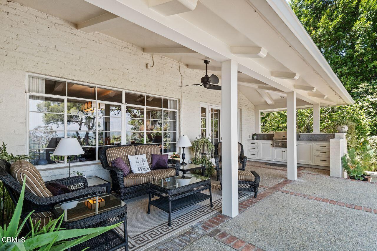 320 North San Rafael Avenue Pasadena, CA 91105 - Photo 44 of 58 a building outdoor space with patio furniture and potted plants