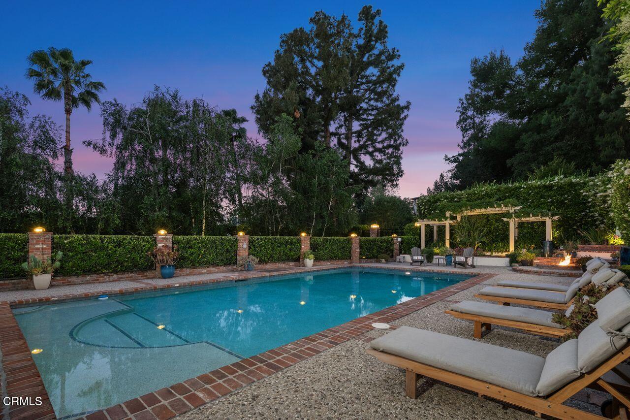 320 North San Rafael Avenue Pasadena, CA 91105 - Photo 50 of 58 a view of a swimming pool with a patio