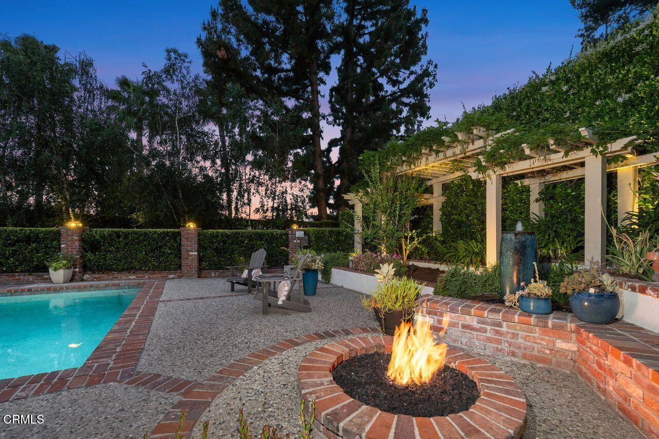 320 North San Rafael Avenue Pasadena, CA 91105 - Photo 51 of 58 a view of a fountain with potted plants and a fountain