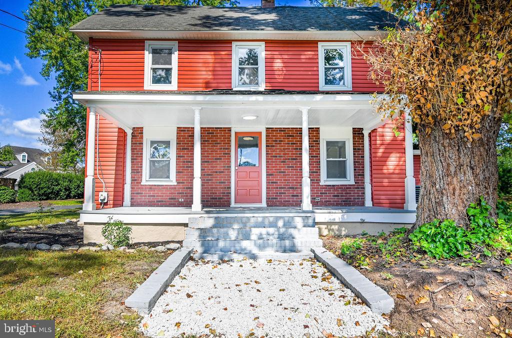 5353 Shad Point Road Salisbury, MD 21801 - Photo 2 of 23 a front view of a house with garden