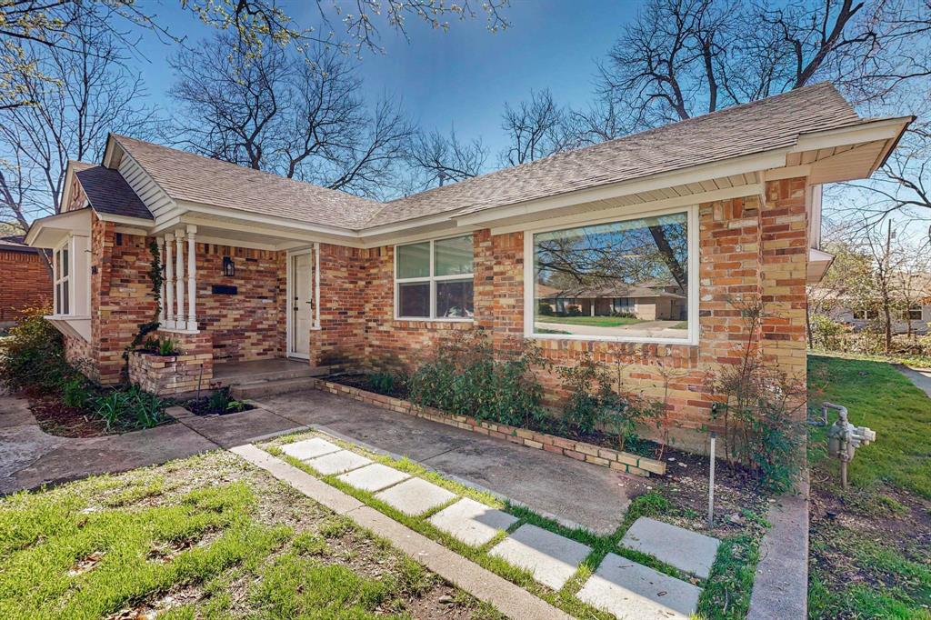 2120 Healey Drive Dallas, TX 75228 - Photo 3 of 39 a front view of a house with garden