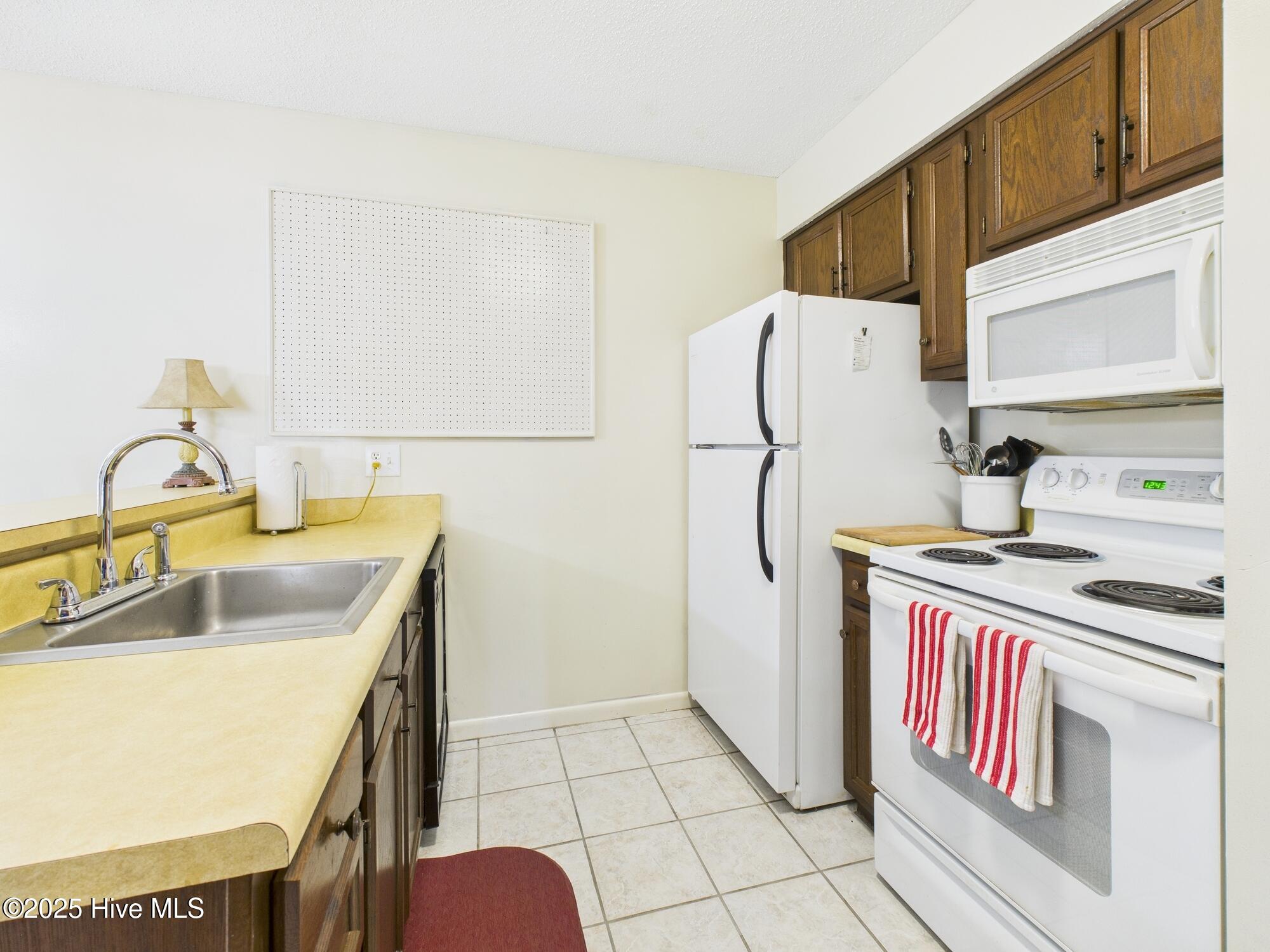 250 Sugar Gum Lane, Unit 201 Pinehurst, NC 28374 - Photo 13 of 39 CAM04094G0-PR0062-STILL025