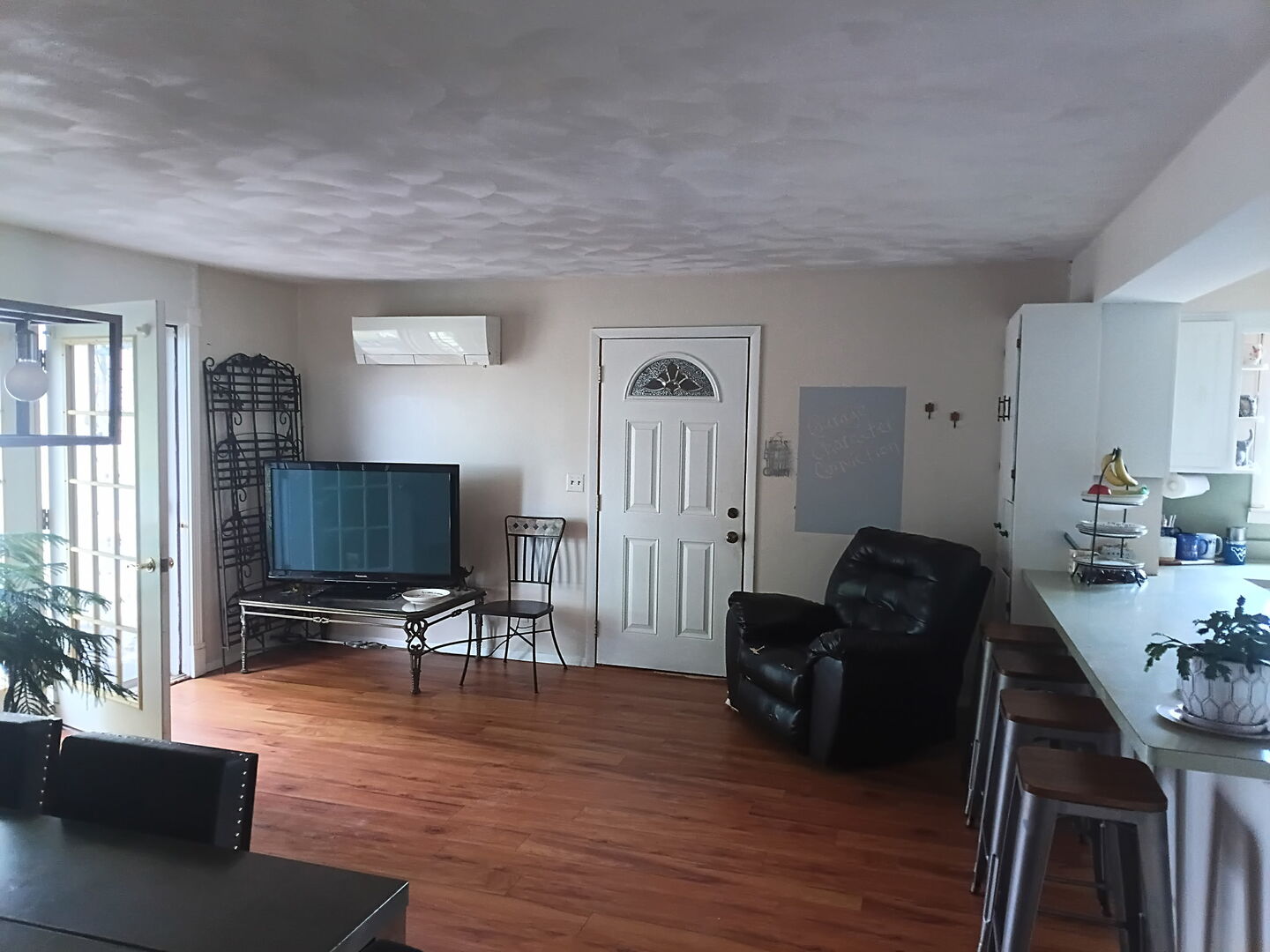 27986 Esmond Road Esmond, IL 60129 - Photo 15 of 39 a living room with furniture and a flat screen tv