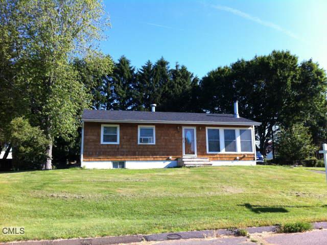 70 Pleasant View Road Derby, CT 06418 - Photo 1 of 1 a front view of house with yard and green space