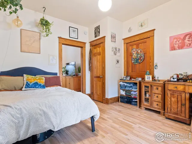 a bedroom with a bed and furniture