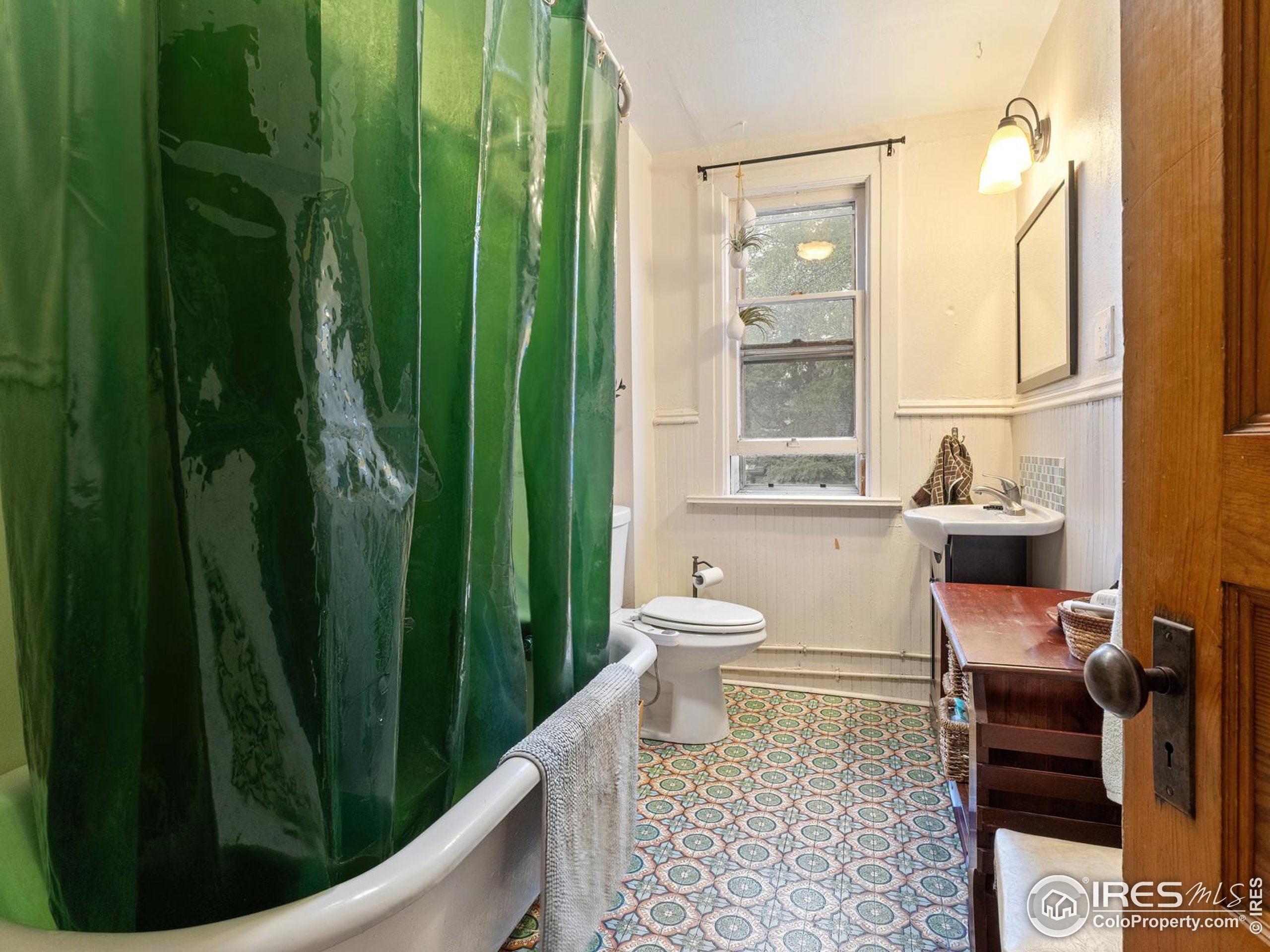 1828 Pine Street Boulder, CO 80302 - Photo 24 of 50 a bathroom with a sink and a toilet