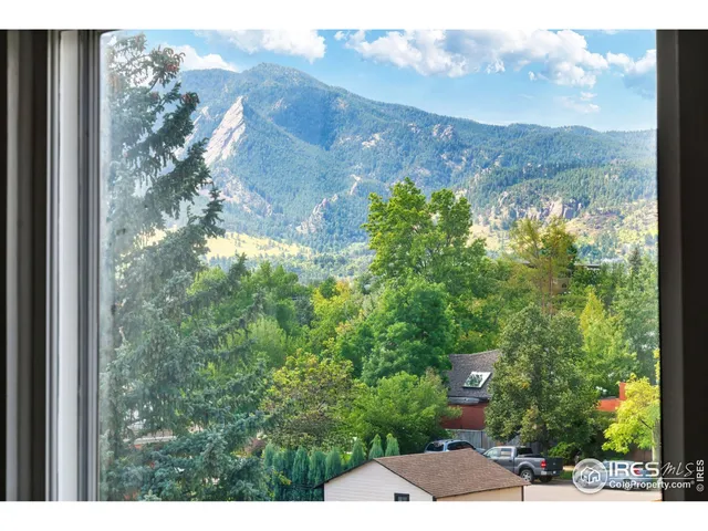 a view of a yard from a balcony