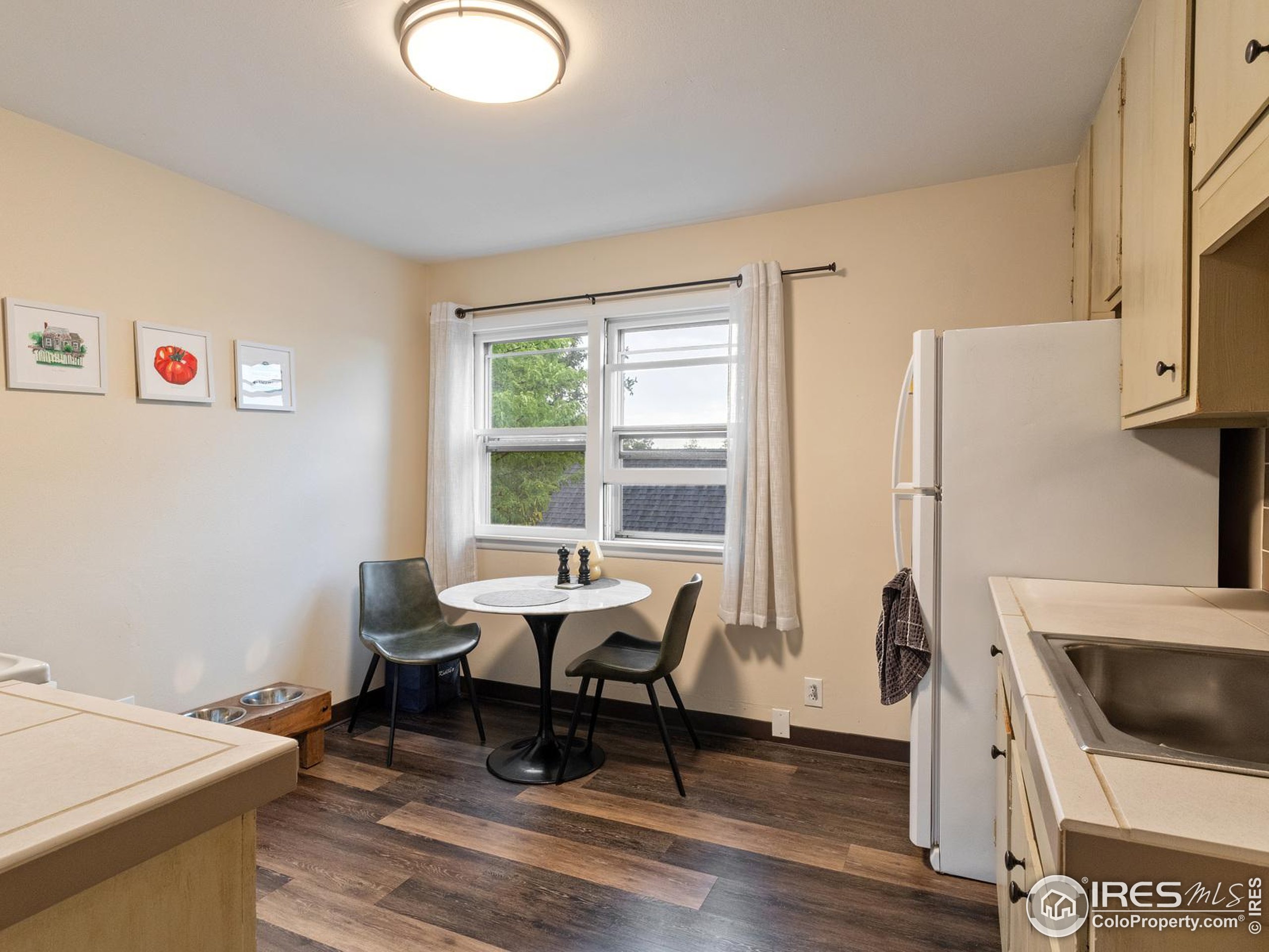 1828 Pine Street Boulder, CO 80302 - Photo 31 of 50 a workspace with furniture hardwood and a window