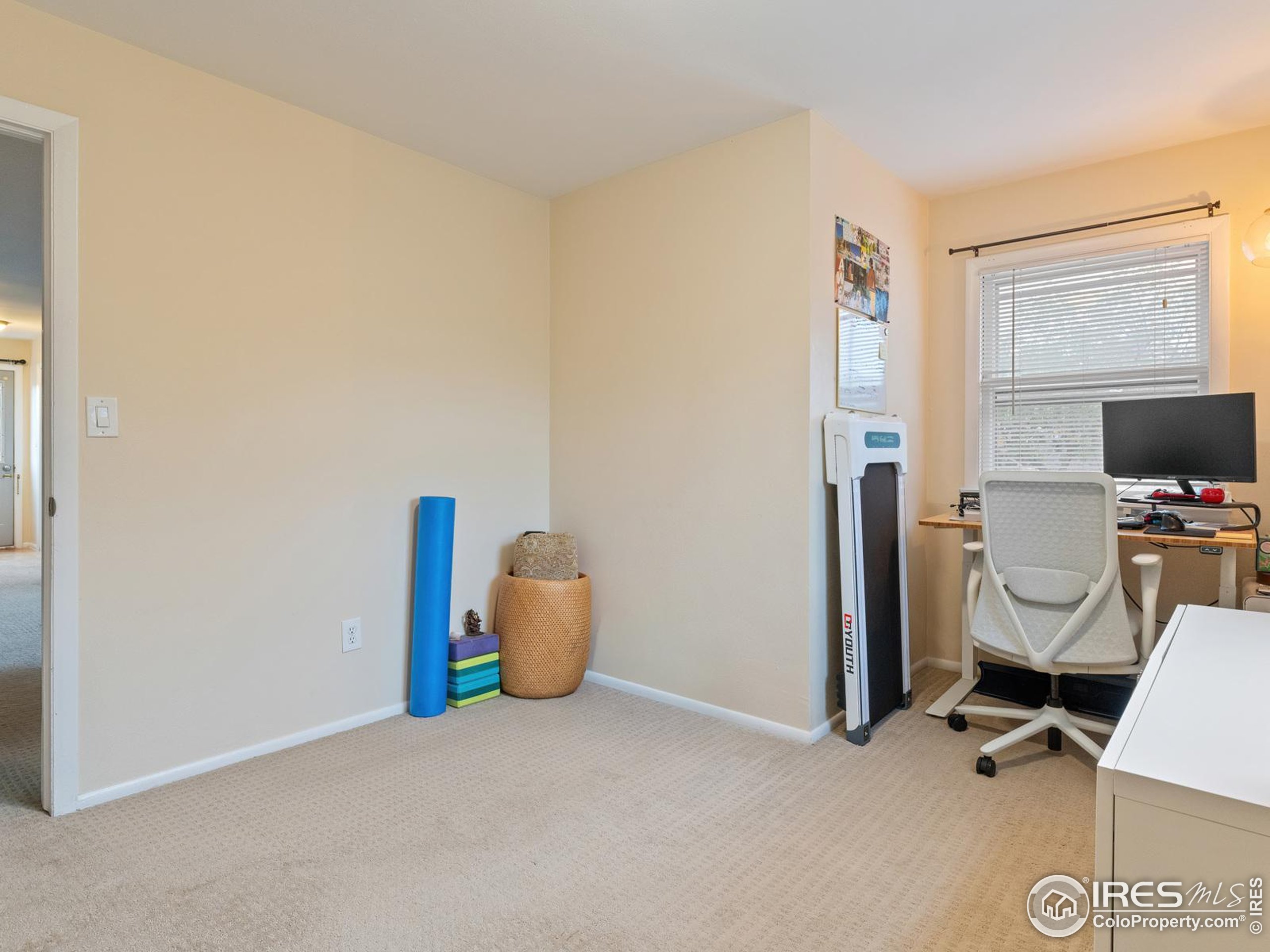 1828 Pine Street Boulder, CO 80302 - Photo 35 of 50 a view of a workspace with furniture and a window