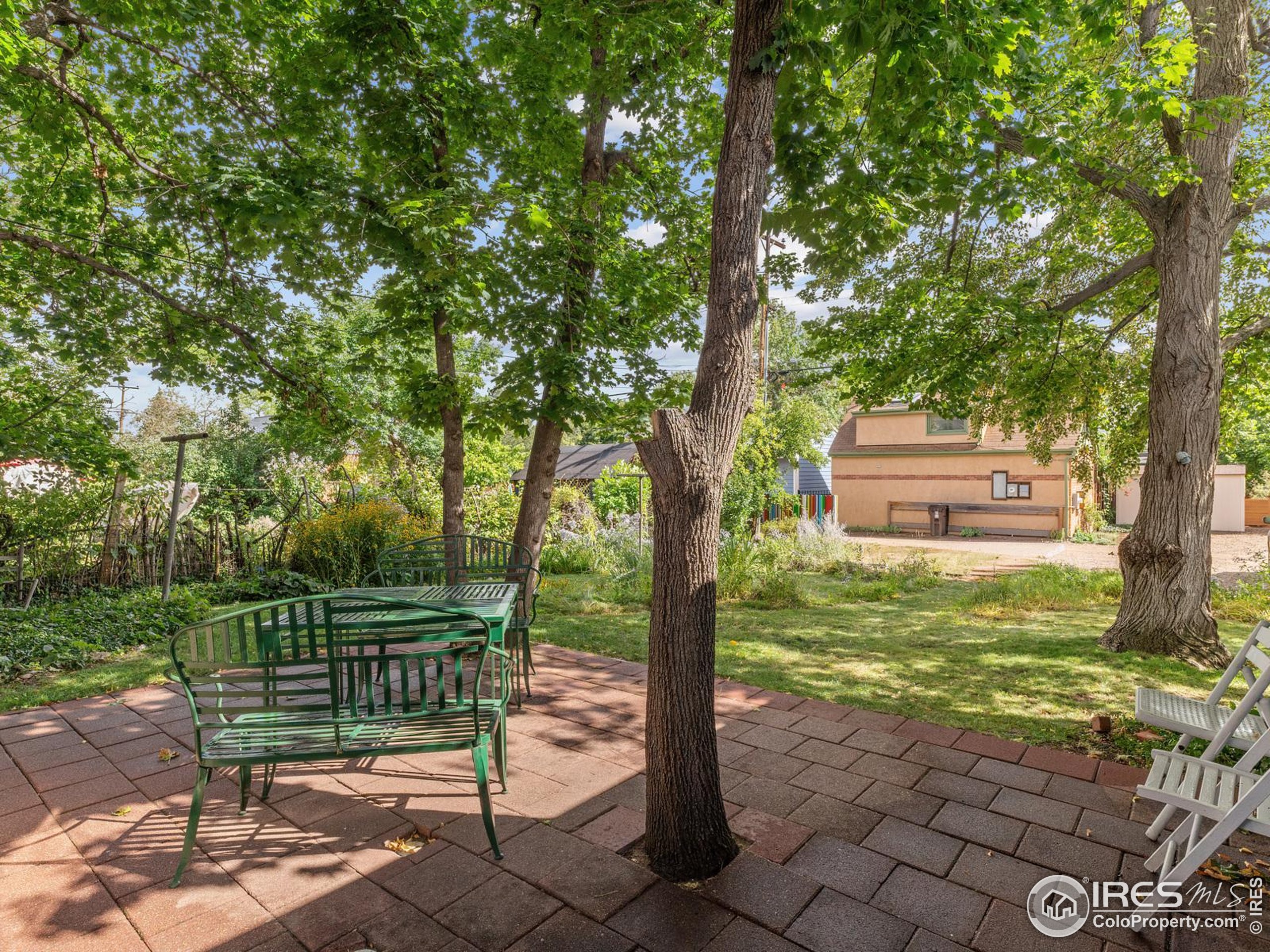 1828 Pine Street Boulder, CO 80302 - Photo 39 of 50 a view of a bench in the garden