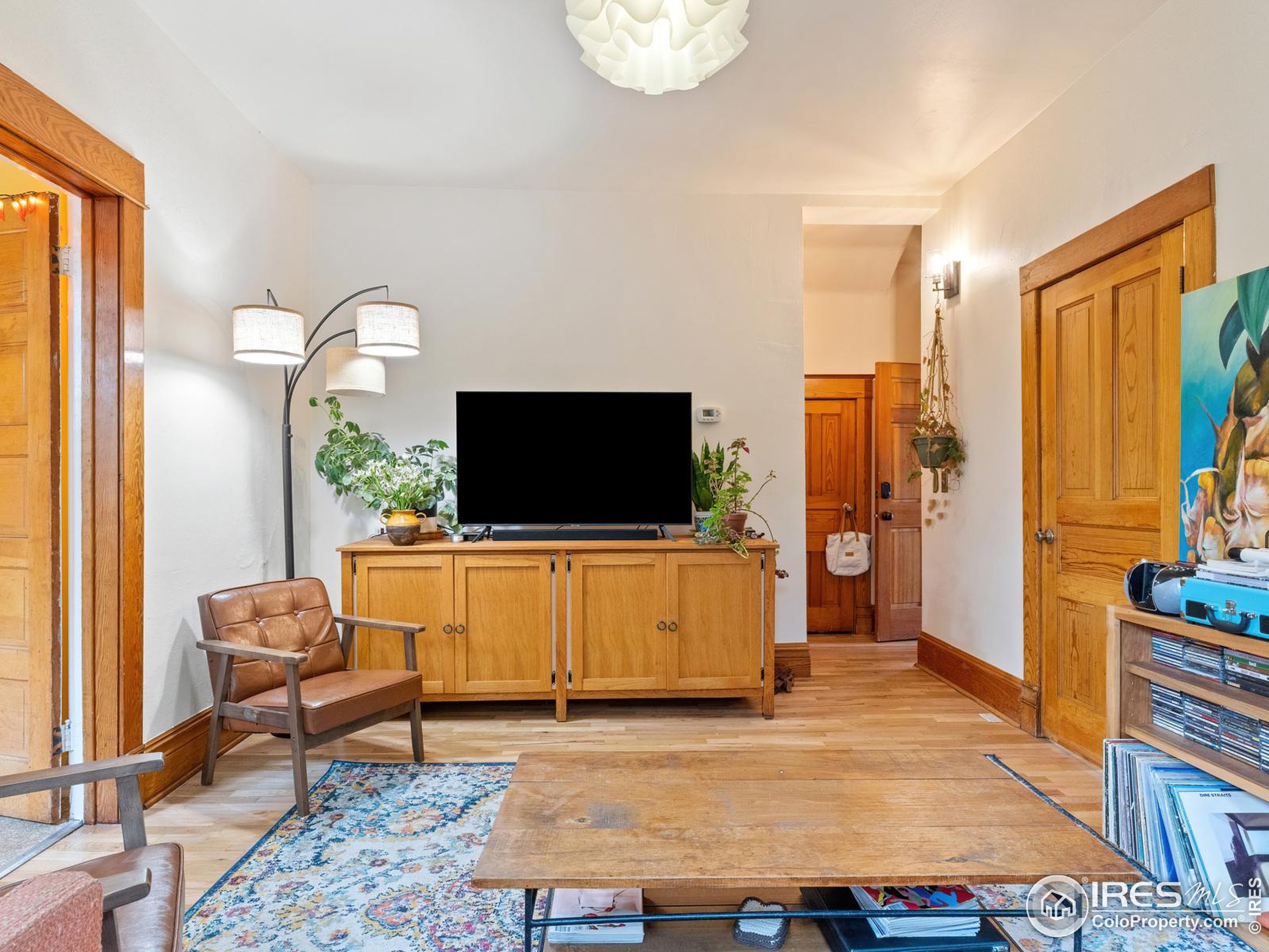 1828 Pine Street Boulder, CO 80302 - Photo 7 of 50 a living room with furniture and a flat screen tv