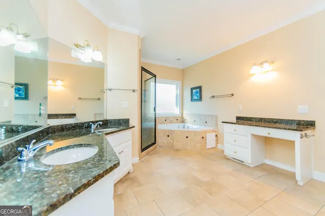 a bathroom with a toilet sink and a bathtub