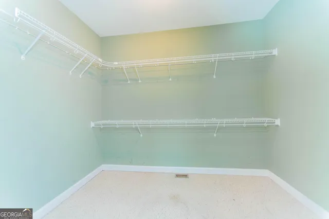 a view of a room with racks on the wall