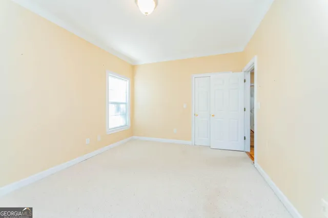 an empty room with windows