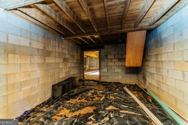 a view of a balcony with wooden floor