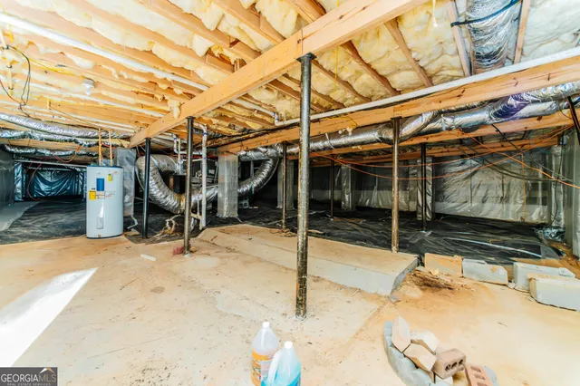 a view of a room with window and a ceiling fan