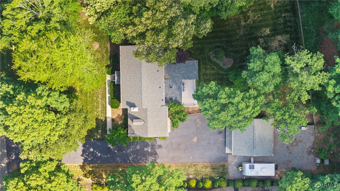 12711 Foxstone Road Midlothian, VA 23113 - Photo 3 of 50 an aerial view of a house with a yard and large trees