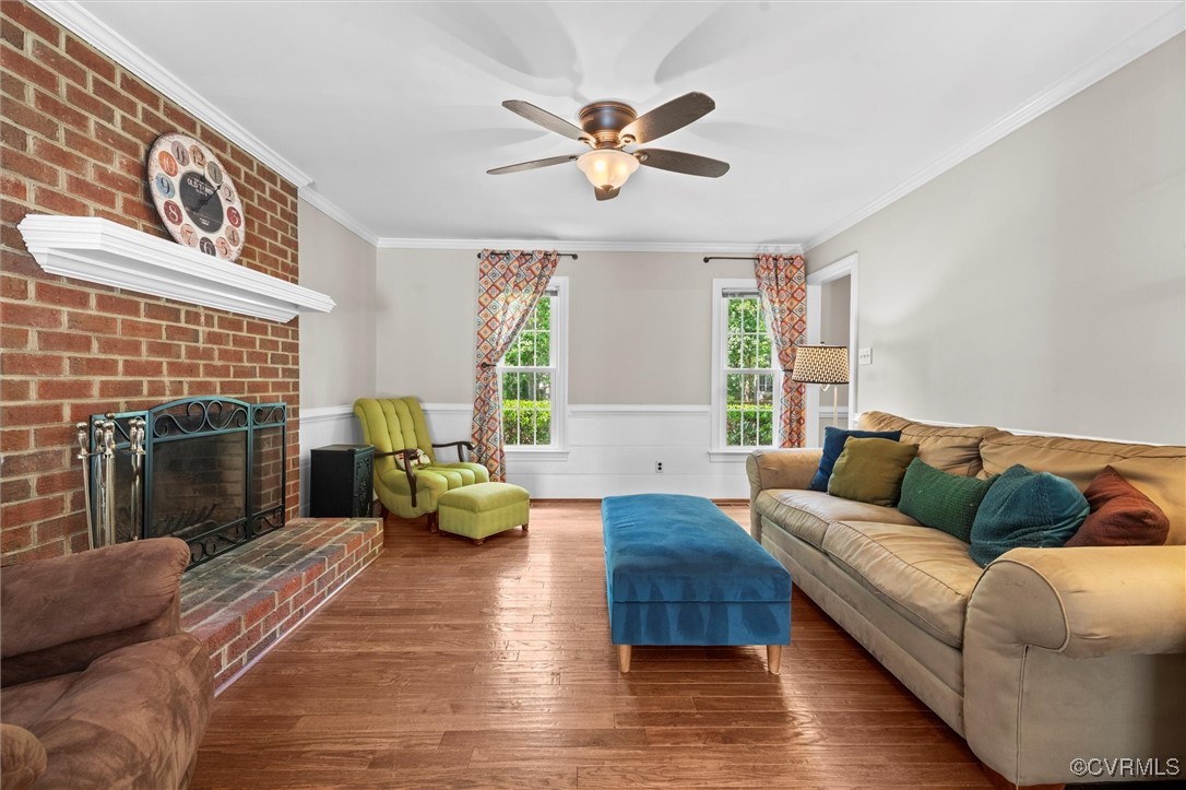 12711 Foxstone Road Midlothian, VA 23113 - Photo 31 of 50 a living room with furniture and a fireplace