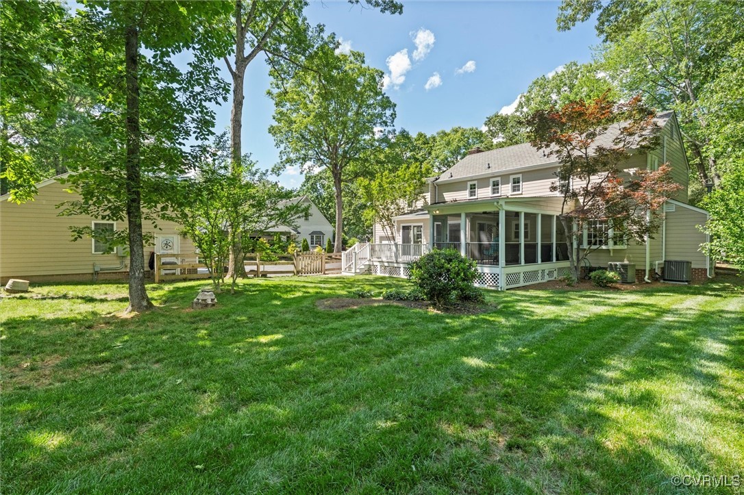 12711 Foxstone Road Midlothian, VA 23113 - Photo 5 of 50 a view of a house with a backyard