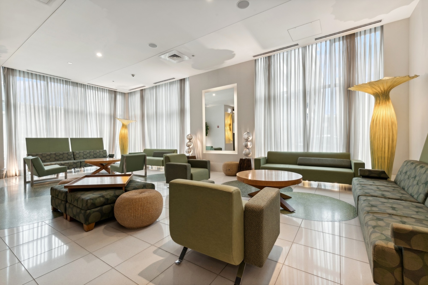 123 South Green Street, Unit 703B Chicago, IL 60607 - Photo 7 of 7 a living room with couches and kitchen view