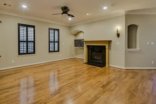 a view of a kitchen cabinets and wooden floor