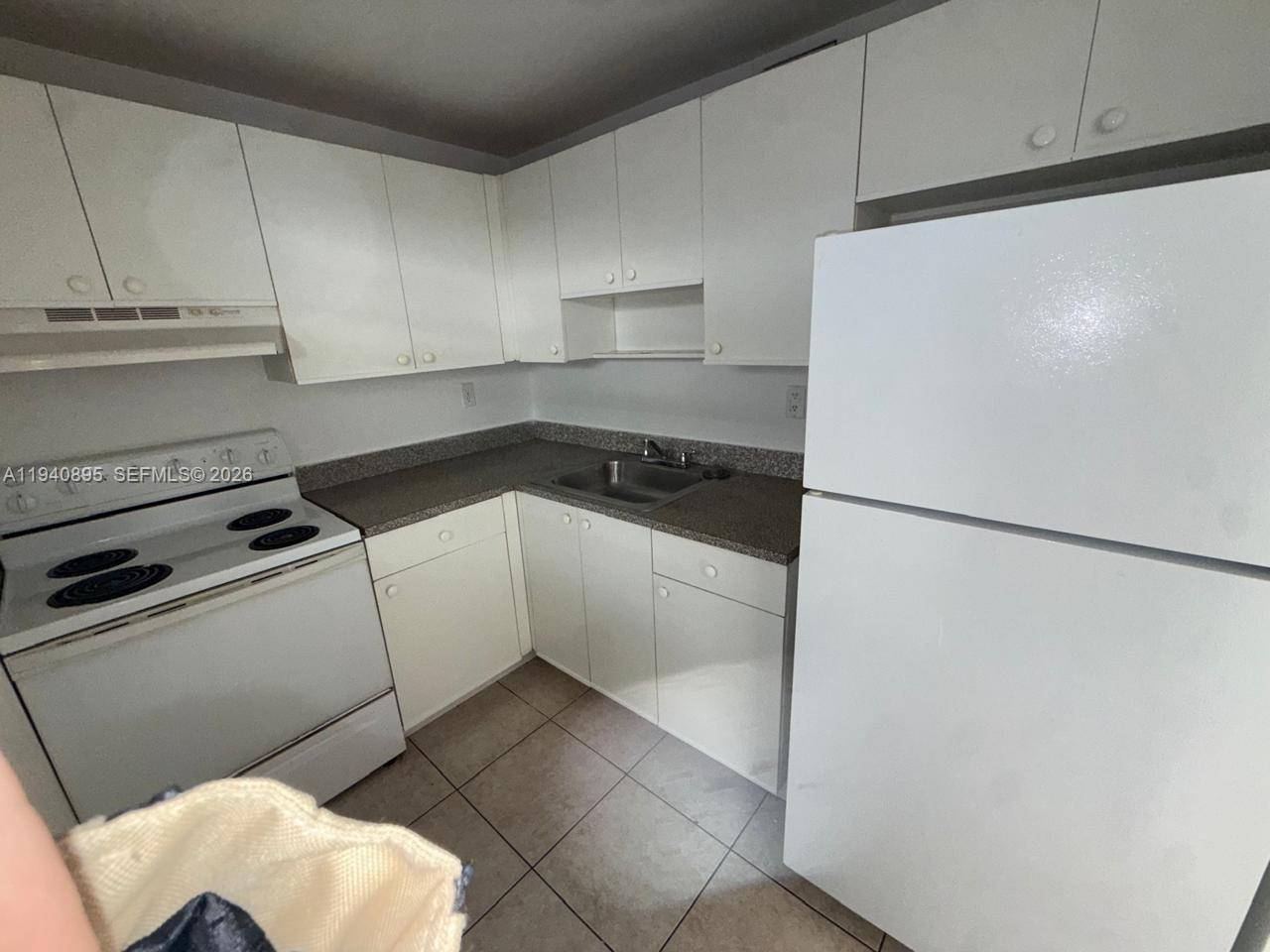 1725 West 60th Street, Unit F206 Hialeah, FL 33012 - Photo 22 of 23